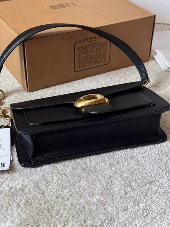 Coach Handbags - Coach Black Leather Shoulder Bag with Gold Hardware and Charm